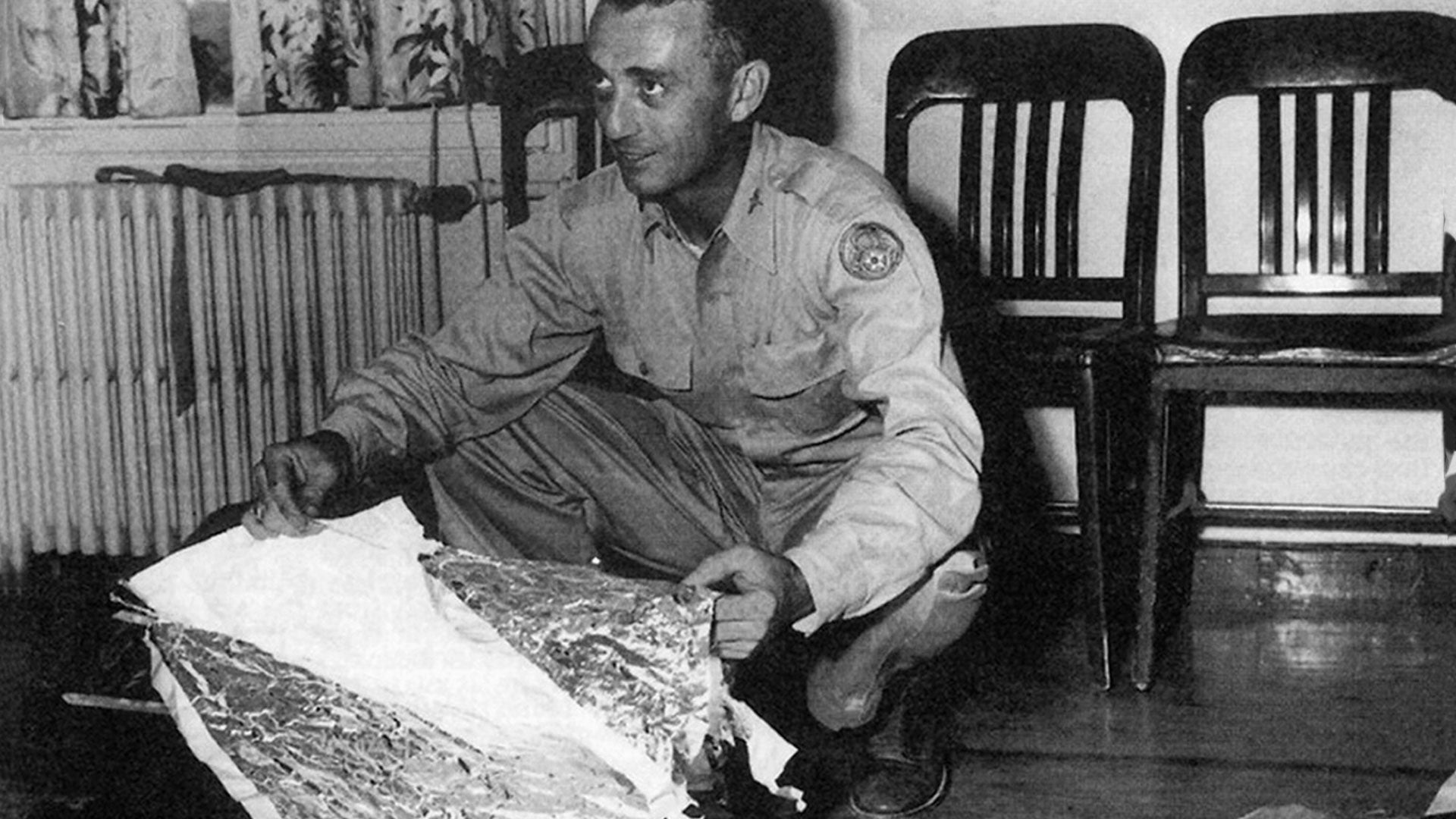 Major Jesse A. Marcel with supposed crash wreckage